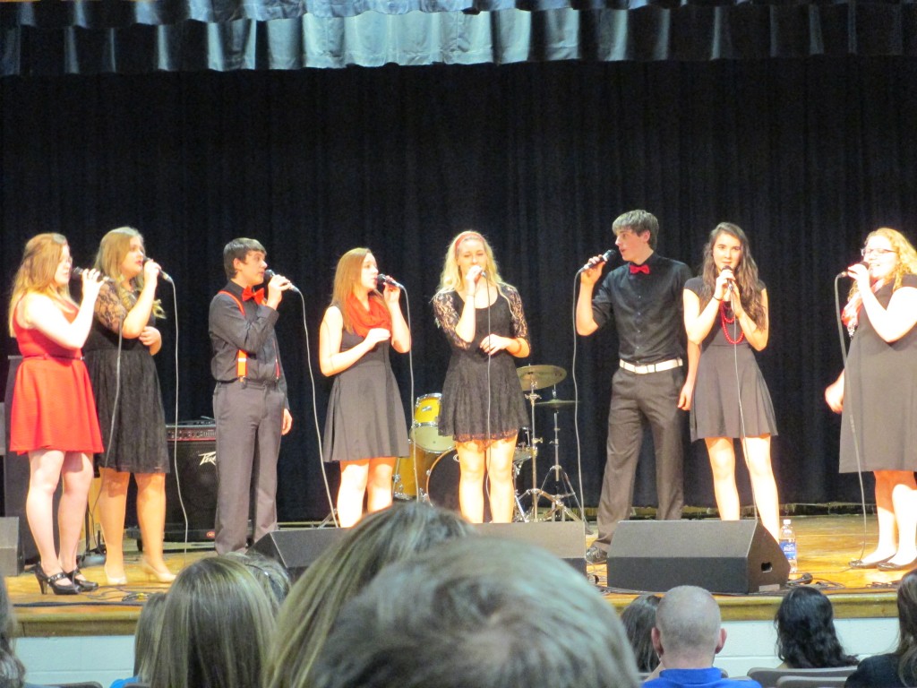 Students singing during a performance