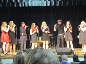 Students singing during a performance